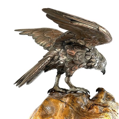 Lot 24 - A Japanese silvered bronze Okimono of a hawk...