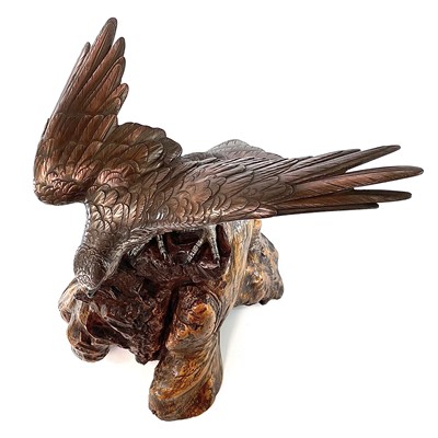 Lot 24 - A Japanese silvered bronze Okimono of a hawk...