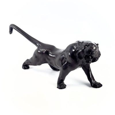 Lot 31 - A Japanese bronze model of a tiger, Meiji...