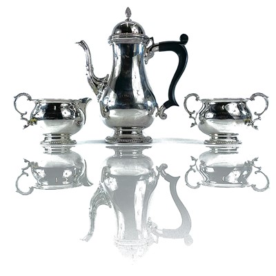 Lot 74 - A modern silver three piece coffee set by...