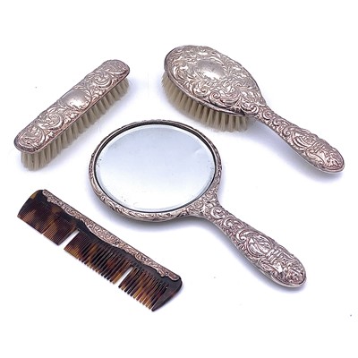 Lot 159 - A 1950's silver four piece dressing table set...
