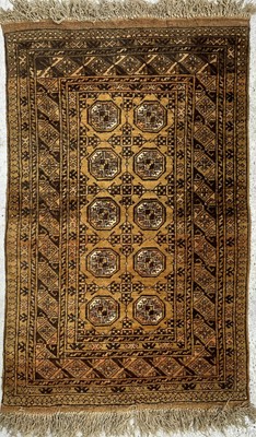 Lot 1207 - A golden Afghan rug, curca 1930's, with five...