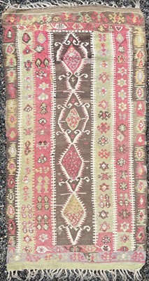 Lot 1239 - An Anatolian kelim, circa 1900, with four...