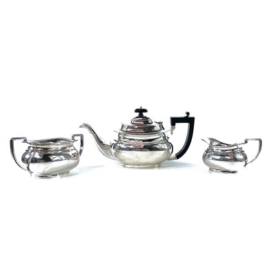 Lot 193 - A George V silver three piece tea set by...