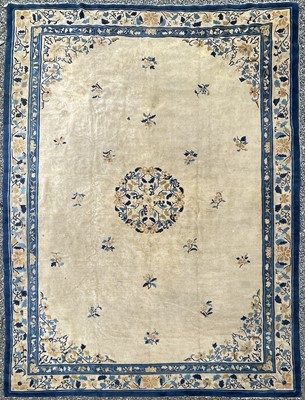 Lot 1232 - A Chinese Peking carpet, circa 1900-1920, 415...