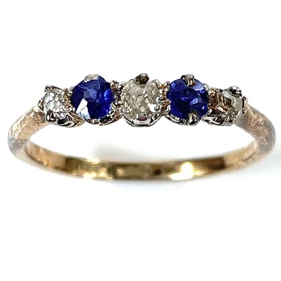 Lot 3 - An 18ct gold diamond and sapphire five stone...