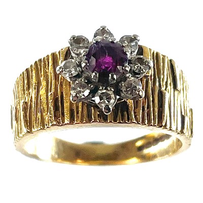 Lot 175 - A 1960's 18ct gold diamond and ruby set...