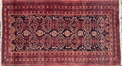 Lot 1204 - An Afghan rug, circa 1920-1930, the indigo...