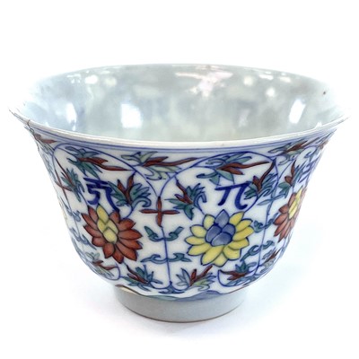 Lot 18 - A Chinese Doucai porcelain tea bowl, 18th...