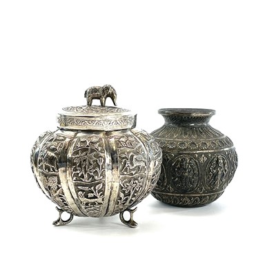 Lot 1030 - An Indian silver circular fluted jar and cover,...