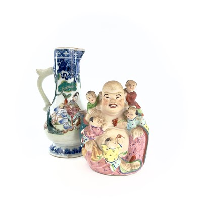 Lot 115 - A Chinese famille rose porcelain jug, 18th...
