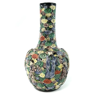 Lot 8 - A Chinese famille verte reticulated bottle...