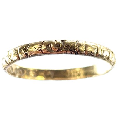 Lot 8 - An early Victorian 18ct hallmarked gold band...