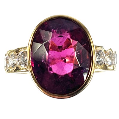 Lot 299 - An 18ct gold pink tourmaline and diamond set...