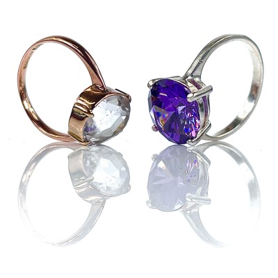 Lot 145 - A 9ct rose gold white stone set dress ring,...