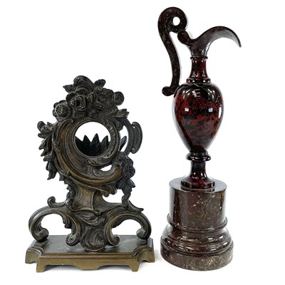 Lot 146 - A serpentine carved and polished ewer on a...