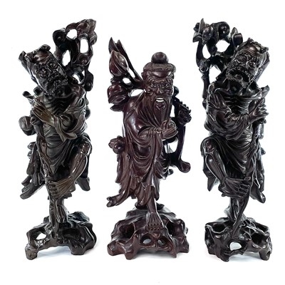 Lot 128 - A pair of Chinese carved hardwood figures,...