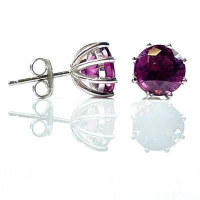 Lot 65 - A pair of 18ct (tested) white gold pink...