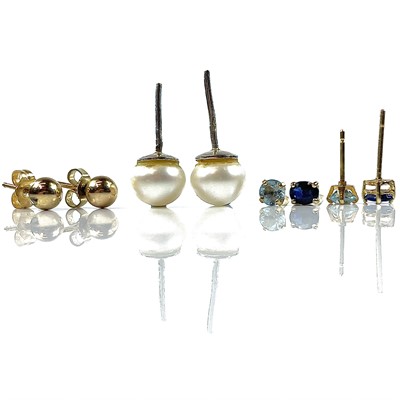 Lot 103 - A pair of blue sapphire set stud earrings,;...