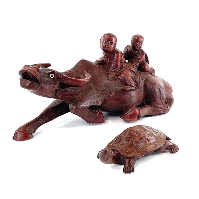 Lot 147 - A Chinese carved wood model of a buffalo,...