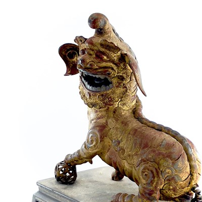 Lot 52 - A Chinese gilt metal model of a dog of fo,...