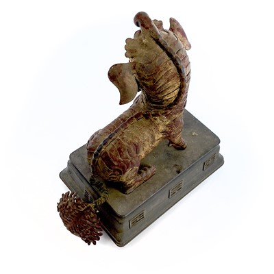 Lot 52 - A Chinese gilt metal model of a dog of fo,...