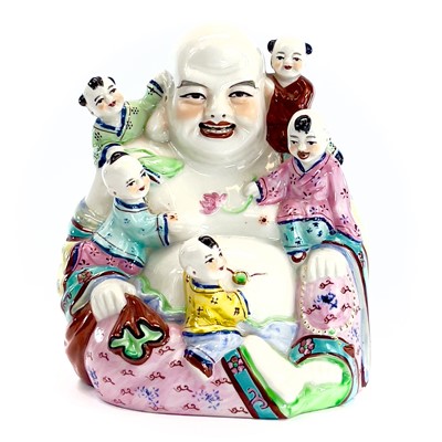 Lot 125 - A Chinese famille rose porcelain figure of...