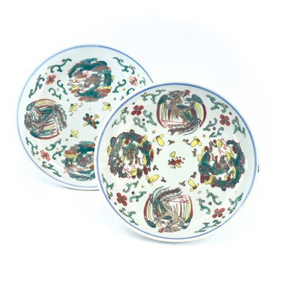 Lot 7 - A near pair of Chinese wucai porcelain plates,...