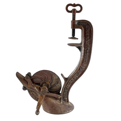 Lot 64 - A cast metal cherry stoner, stamped Enterprise...