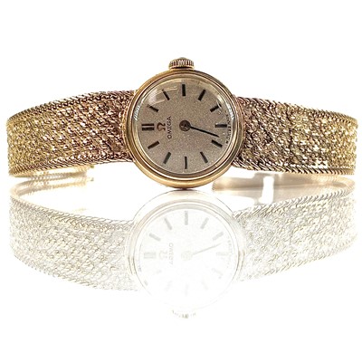 Lot 356 - An Omega 9ct gold ladies manual wind bracelet...