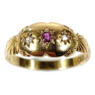 Lot 182 - An Edwardian 18ct gold diamond and ruby three...
