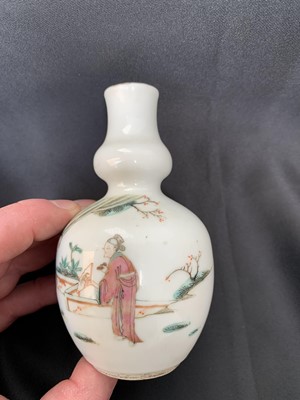 Lot 5 - A Chinese famille rose porcelain double gourd...