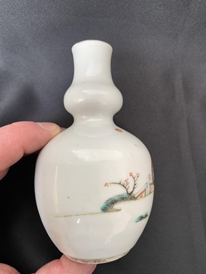 Lot 5 - A Chinese famille rose porcelain double gourd...