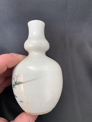 Lot 5 - A Chinese famille rose porcelain double gourd...