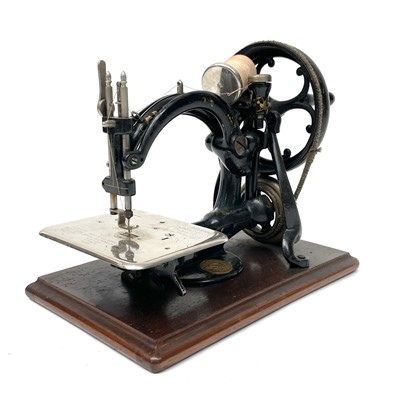 Lot 7 - A Willcox and Gibbs 'Silent' sewing machine,...