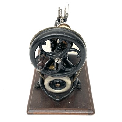 Lot 7 - A Willcox and Gibbs 'Silent' sewing machine,...