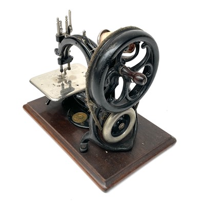Lot 7 - A Willcox and Gibbs 'Silent' sewing machine,...