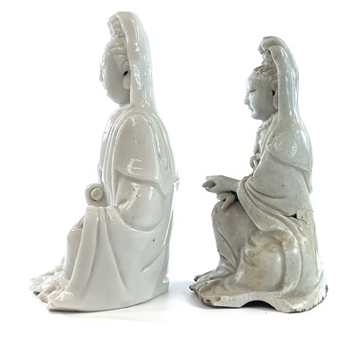Lot 40 - Two Chinese blanc de chine figures of Guanyin,...
