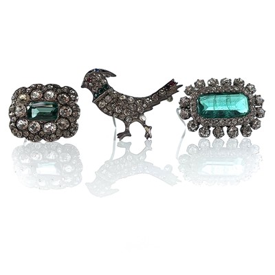 Lot 278 - Three white metal paste set brooches, two are...