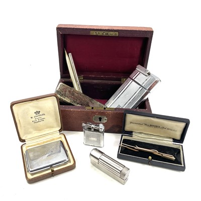 Lot 231 - A cigarette case with attached lighter...