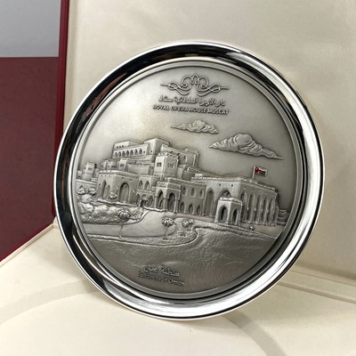Lot 176 - A cast metal and enamel commemorative plate...