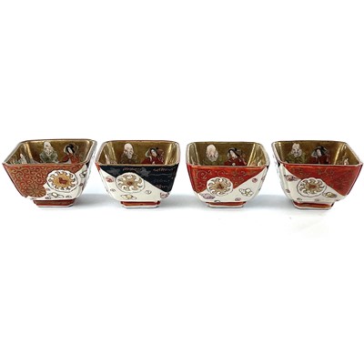 Lot 79 - A set of four Japanese porcelain saki cups,...