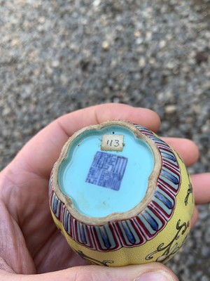 Lot 56 - A Chinese yellow ground and famille rose water...