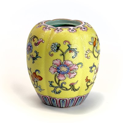 Lot 56 - A Chinese yellow ground and famille rose water...