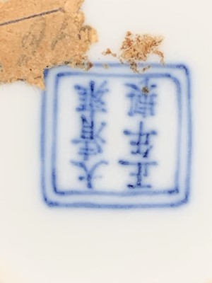 Lot 216 - A Chinese doucai porcelain cup, Qing Dynasty,...