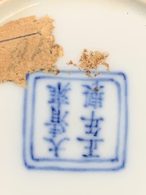 Lot 216 - A Chinese doucai porcelain cup, Qing Dynasty,...