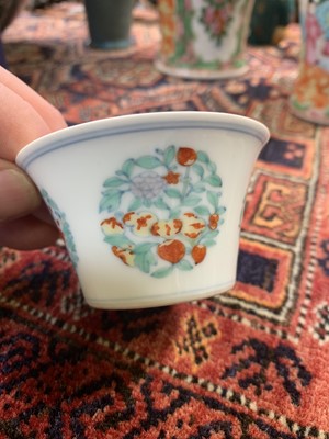 Lot 216 - A Chinese doucai porcelain cup, Qing Dynasty,...