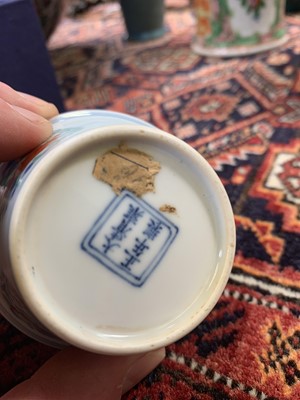 Lot 216 - A Chinese doucai porcelain cup, Qing Dynasty,...