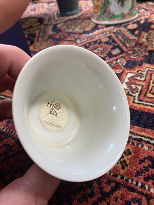 Lot 216 - A Chinese doucai porcelain cup, Qing Dynasty,...