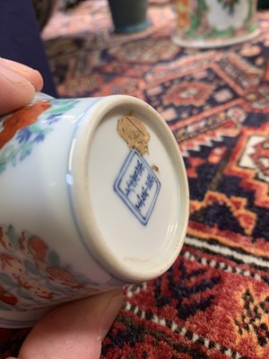Lot 216 - A Chinese doucai porcelain cup, Qing Dynasty,...